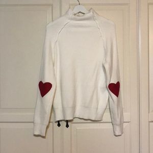 white sweater with heart elbow patches